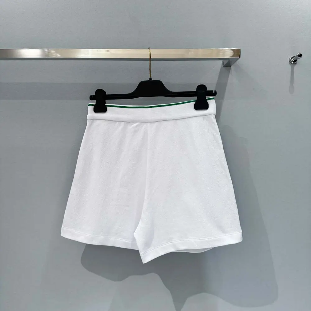 Side angle showing fit and silhouette of Dior Women Vibe Skort