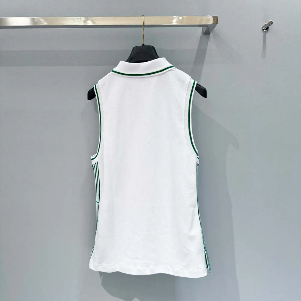 Side angle showing sleeveless silhouette of Dior Women Vibe Polo Shirt