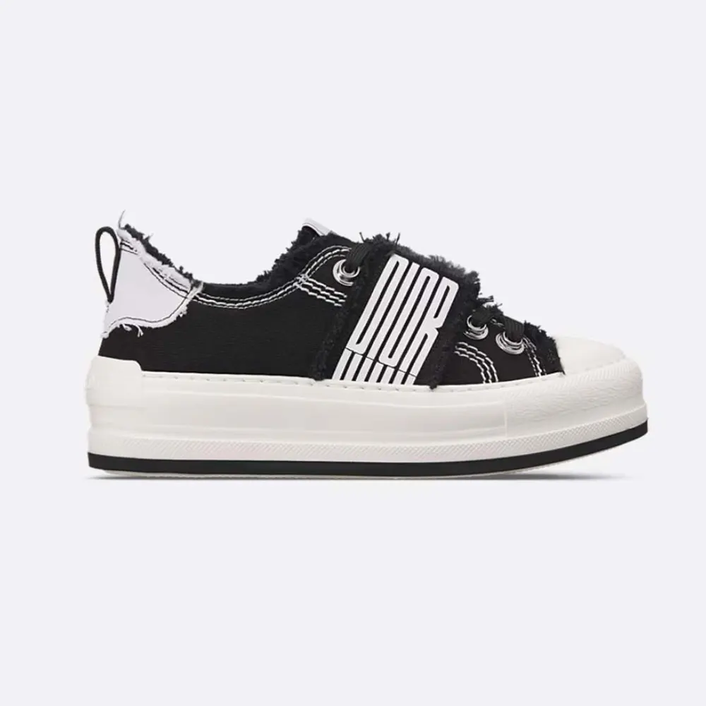 Side view of Dior Women Walk’n’Dior Platform Sneaker Black and White Fringed Cotton Canvas