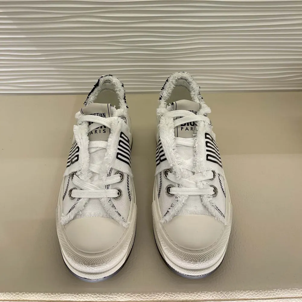 Close-up on fringed cotton canvas detail of Dior Women Walk’n’Dior Platform Sneaker
