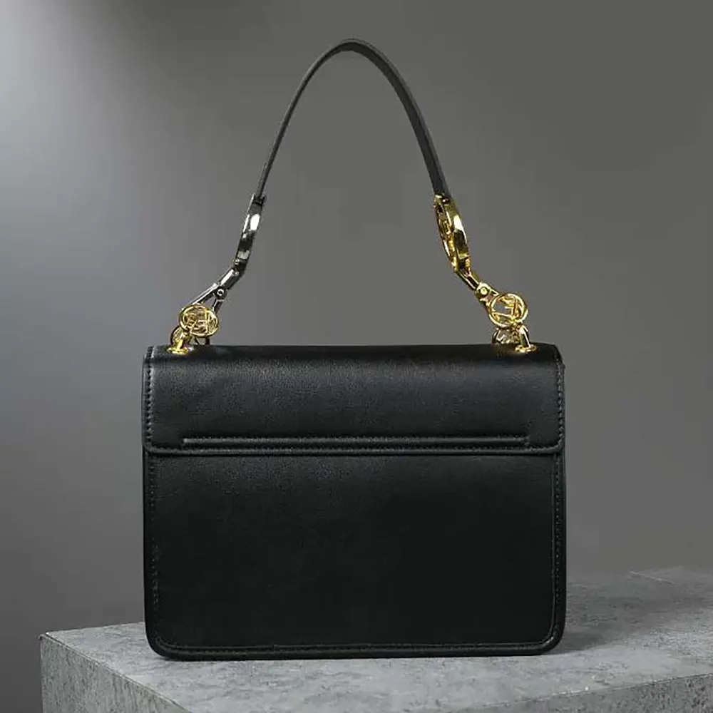 Side profile showing structured silhouette of Fendi Women Kan I F Leather Bag