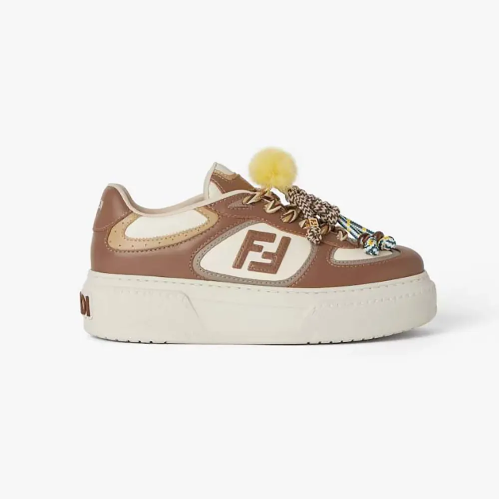 Side view of Fendi Women Match Brown Leather Platform Low-Tops With Charm