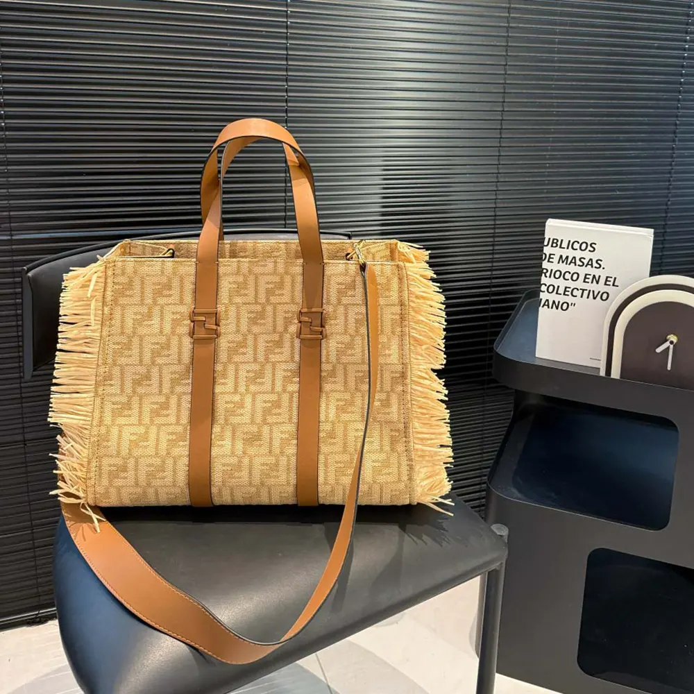 Close-up of raffia detailing and gold FF hardware on Fendi tote