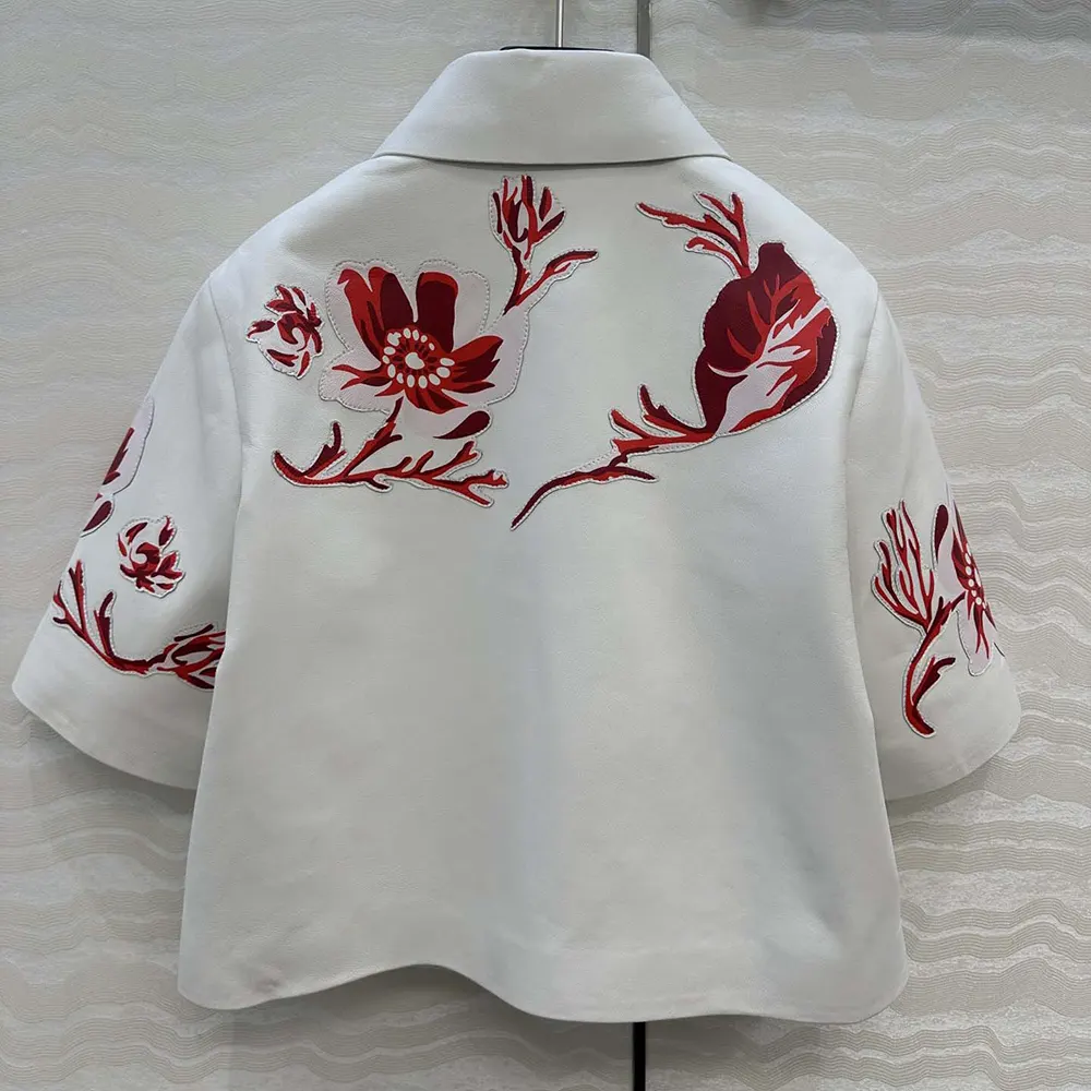 Side profile showing tailored silhouette of Fendi Women White Inlaid Leather Jacket