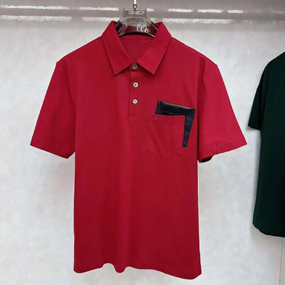 Close-up detail of red fabric and pocket on Hermes Men Polo Shirt