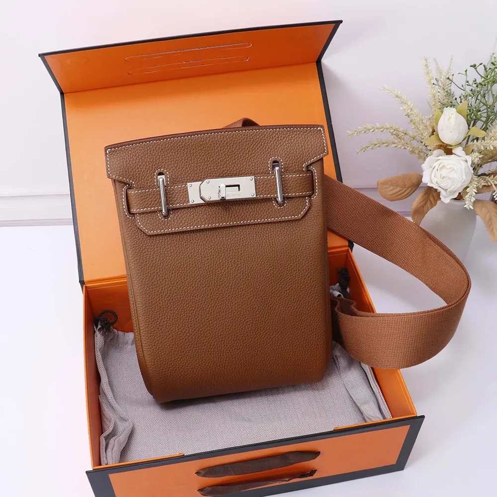 Close-up of polished silver hardware on Hermes Unisex Hac A Dos PM Backpack-Brown