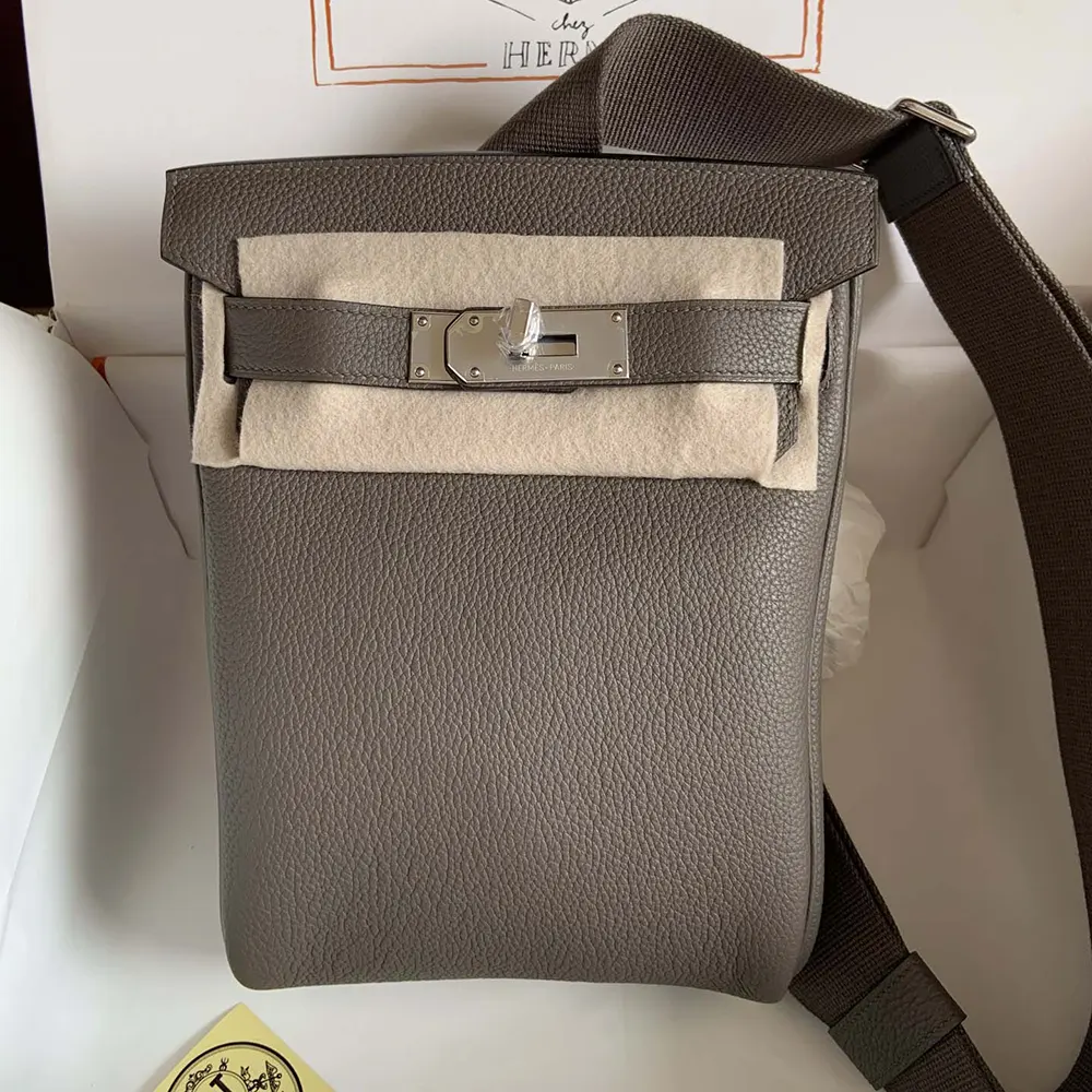 Close-up of silver hardware on Hermes Unisex Hac A Dos PM Backpack-Gray