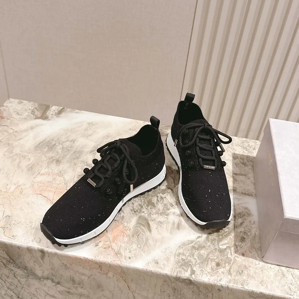 Front angle showing lace-up closure on Jimmy Choo Women Veles trainers