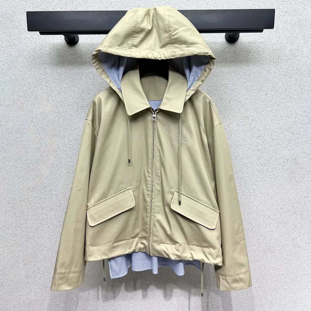 Close-up of cotton fabric and matte metal hardware on Loewe Men Hooded Parka