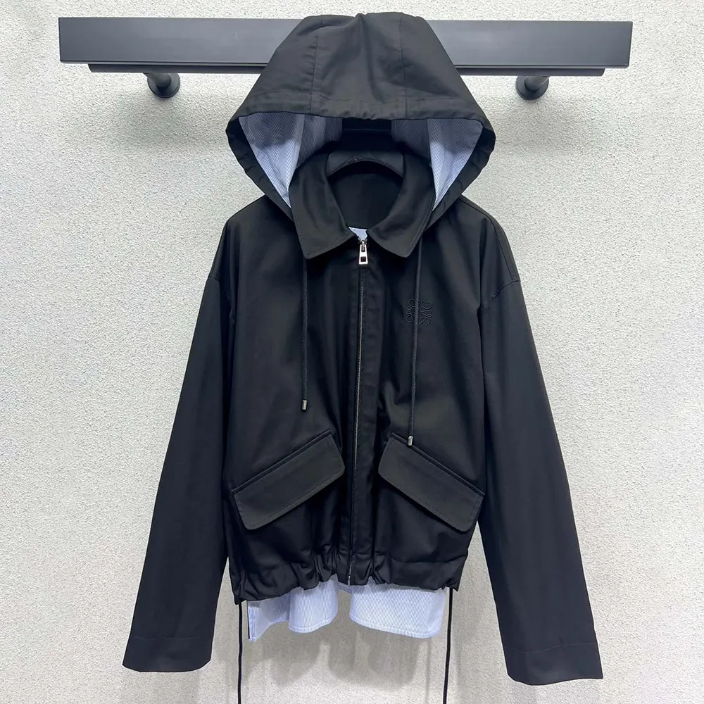 Close-up on black branded zipper detail of Loewe Men Hooded Parka