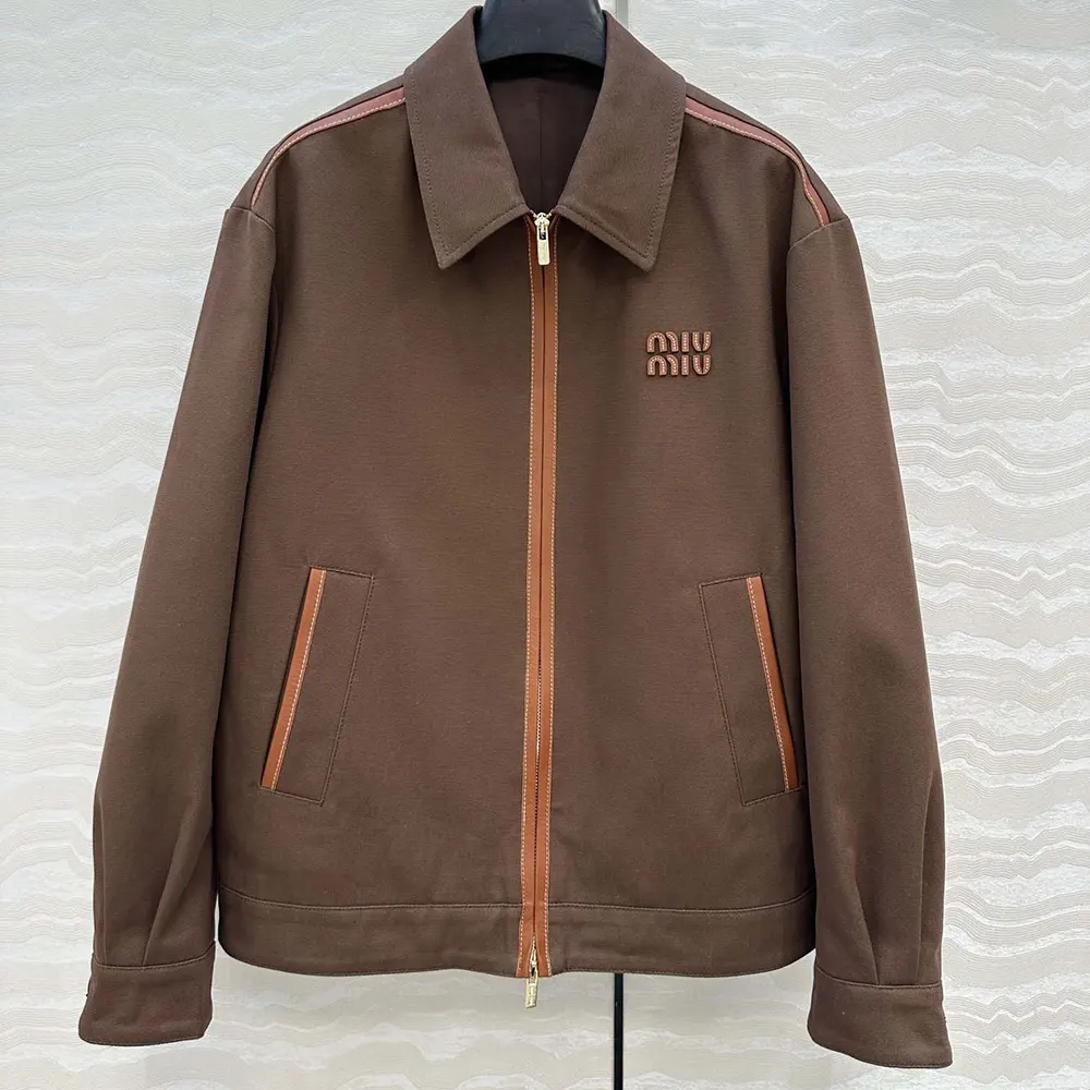 Close-up of jacquard fabric texture on Miu Miu Women Jacquard Canvas Blouson Jacket
