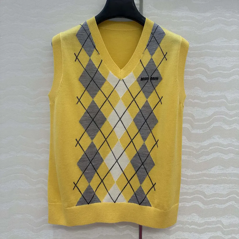 Close-up of soft cashmere knit on Miu Miu Women Cashmere Vest