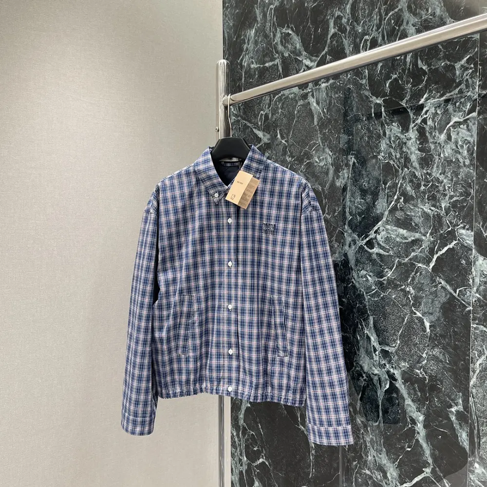 Close-up of checked fabric and zipper on Miu Miu Women Checked Fabric Blouson Jacket