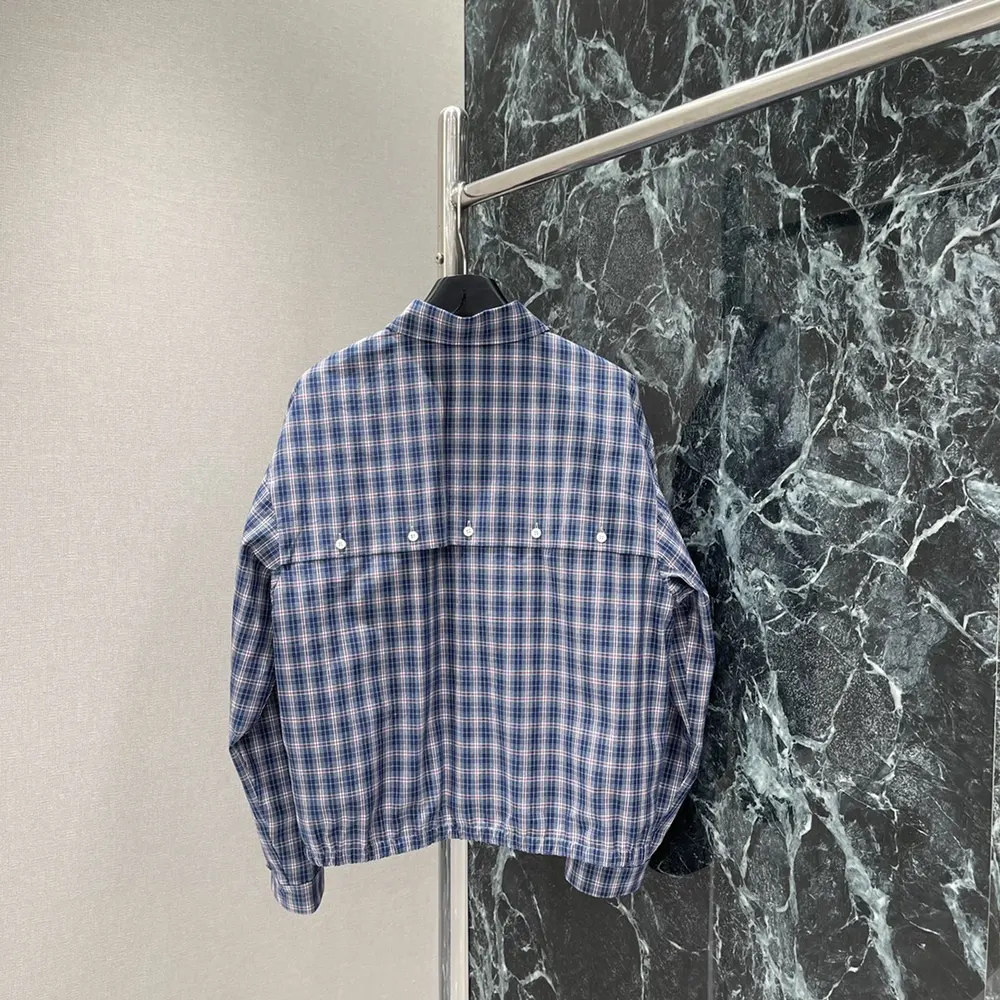 Side angle showing silhouette and cuff detail of Miu Miu Women Checked Fabric Blouson Jacket