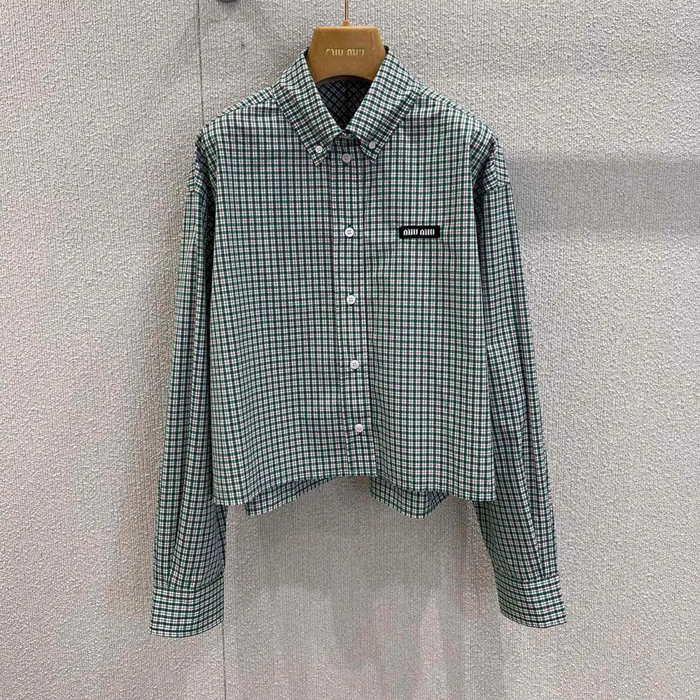 Close-up of button closure on Miu Miu Women Checked Shirt