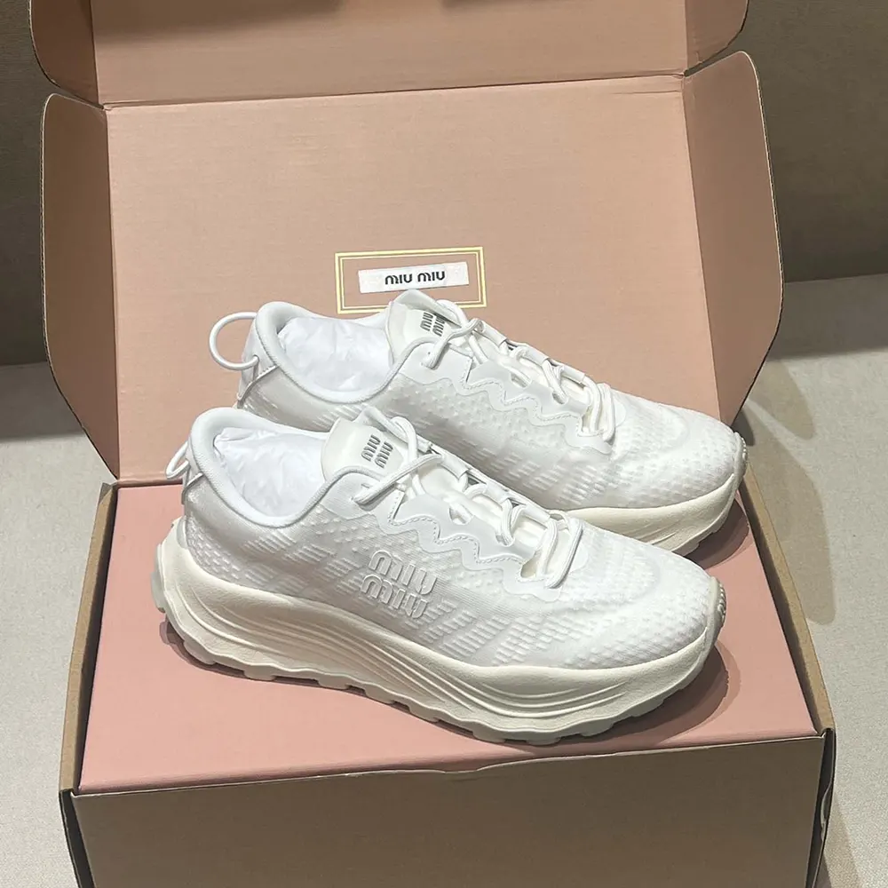 Top view of lace-up design on Miu Miu Women Technical Fabric Sneakers-White