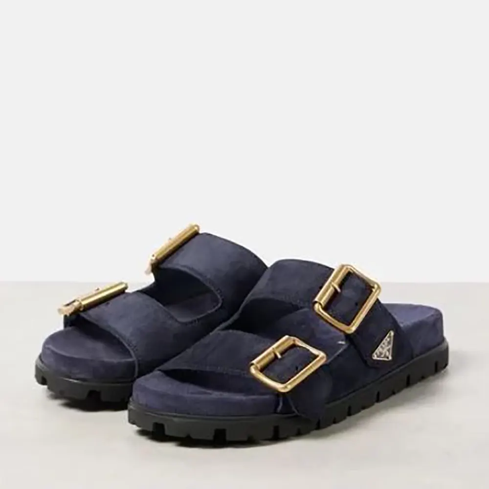 Close-up of metal buckle detail on Prada Suede Strap Slides navy