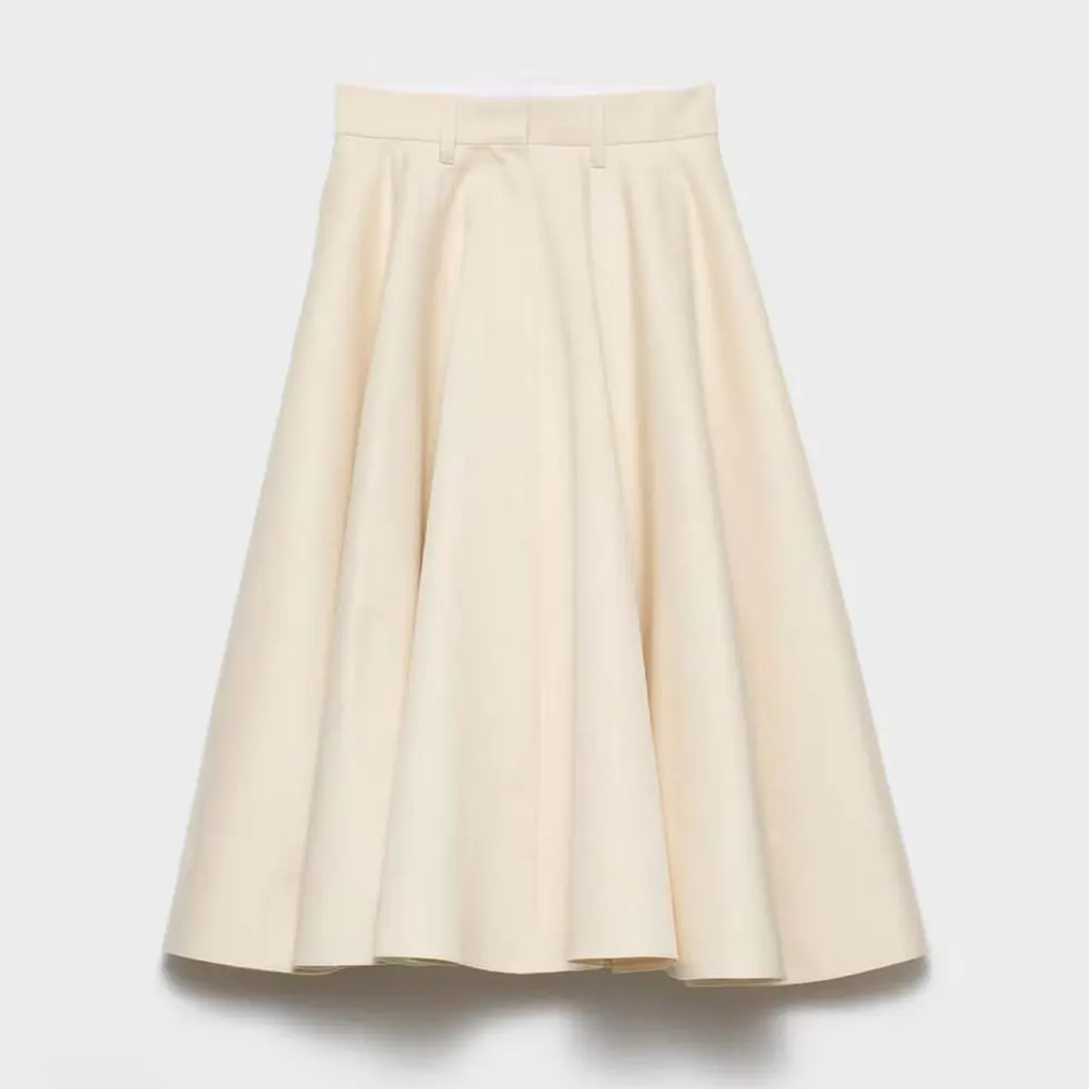 Front view of Prada Women Chino Midi-skirt in white on model