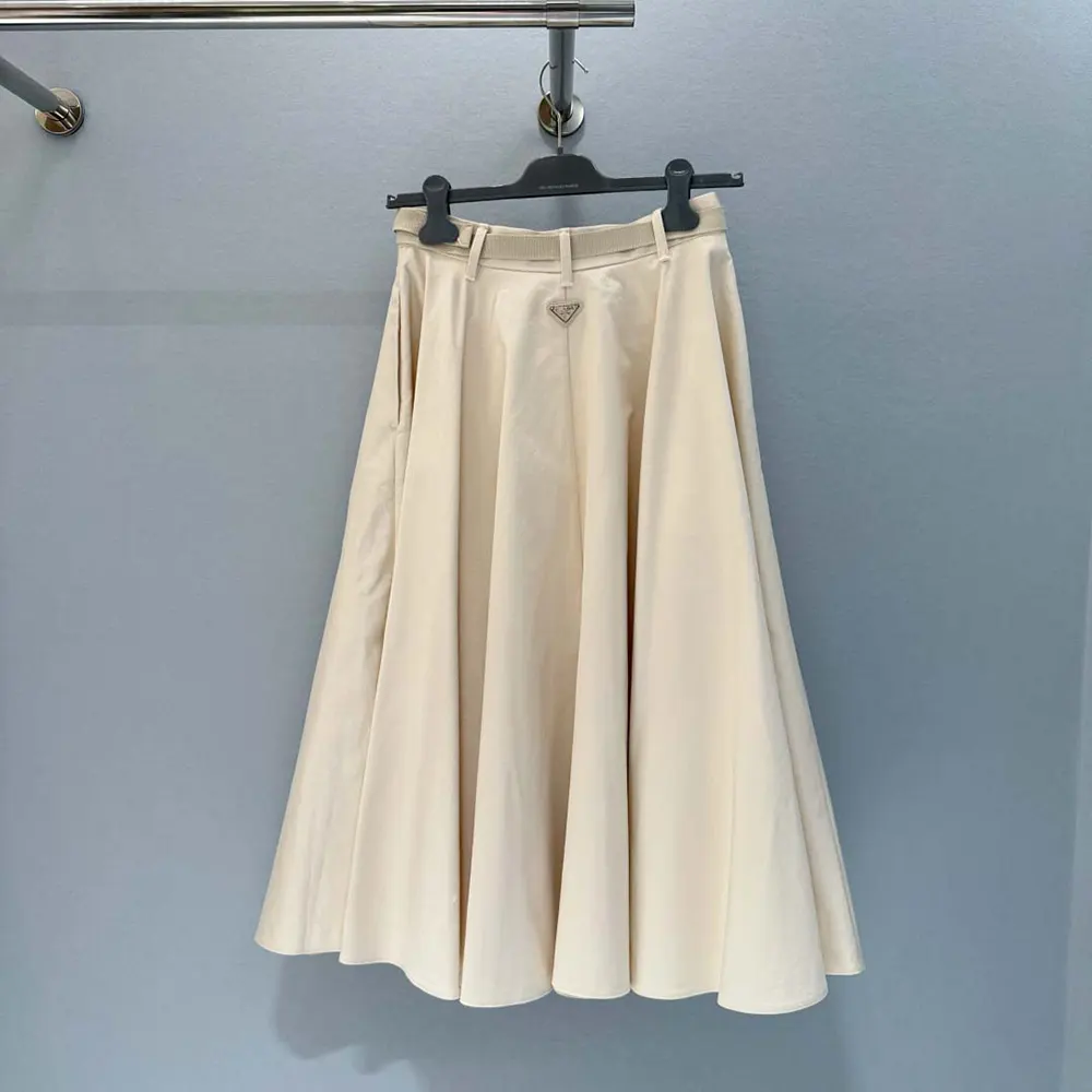 Side angle showing A-line silhouette of Prada Women Chino Midi-skirt