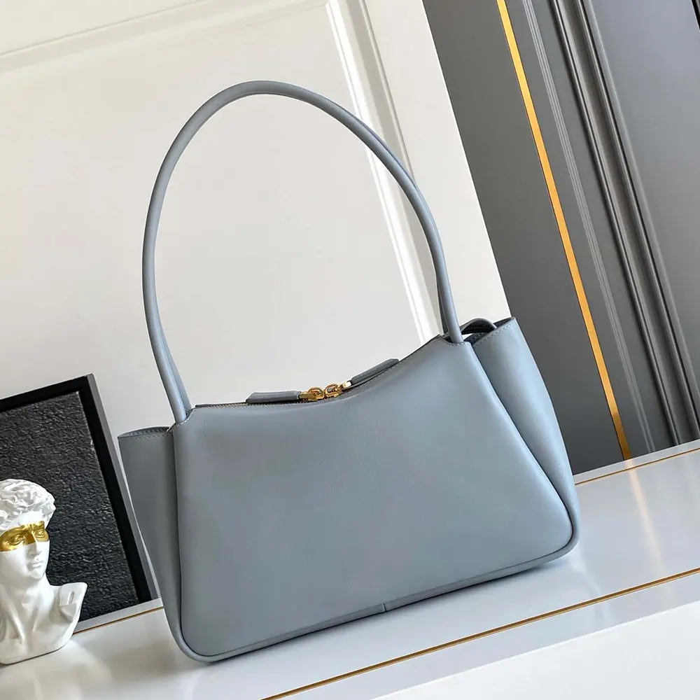 Side angle showing structured silhouette of Prada Women Darling bag