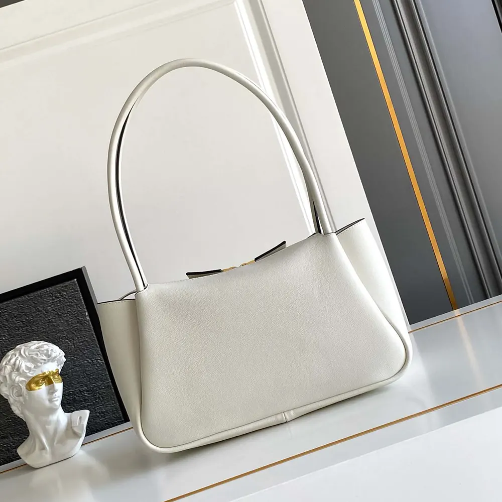 Side angle of Prada Women Darling Medium Leather Shoulder Bag-White highlighting silhouette