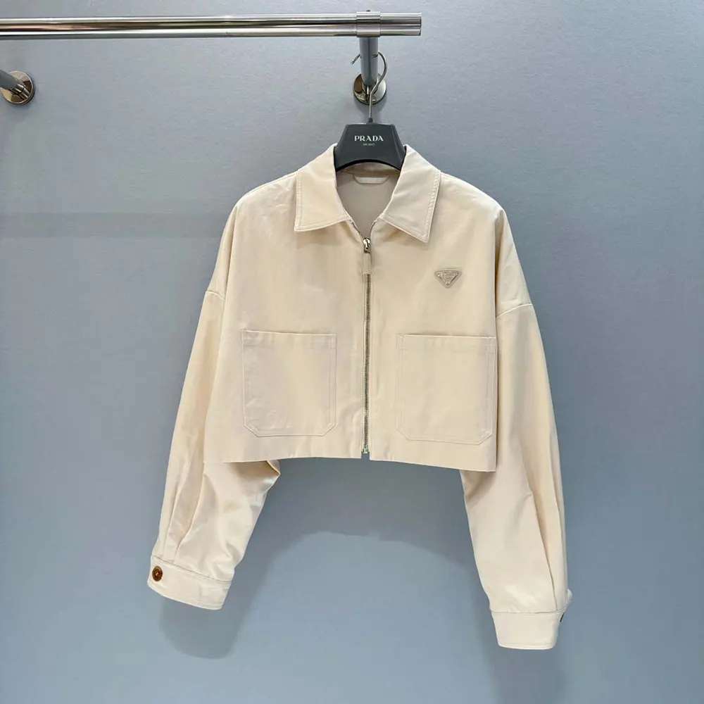 Close-up on silver hardware and zipper of Prada Women Denim Blouson Jacket