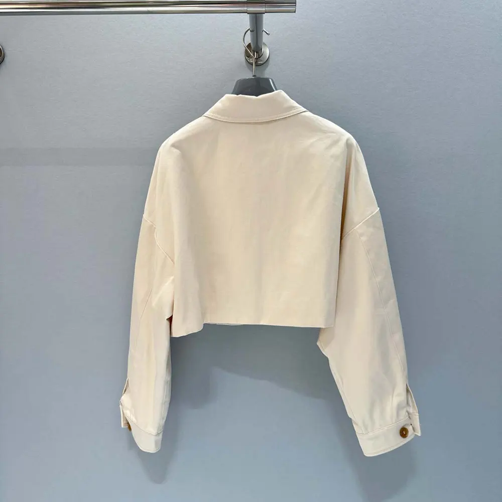 Side profile showcasing relaxed fit of Prada Women Denim Blouson Jacket