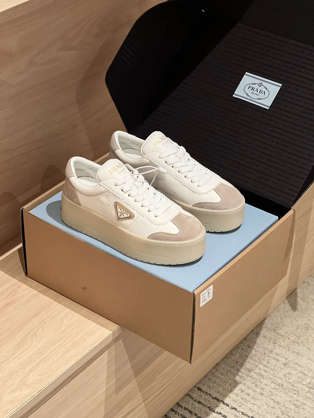 Top view showing lace closure and mixed leather on Prada Women Downtown Bold Sneakers