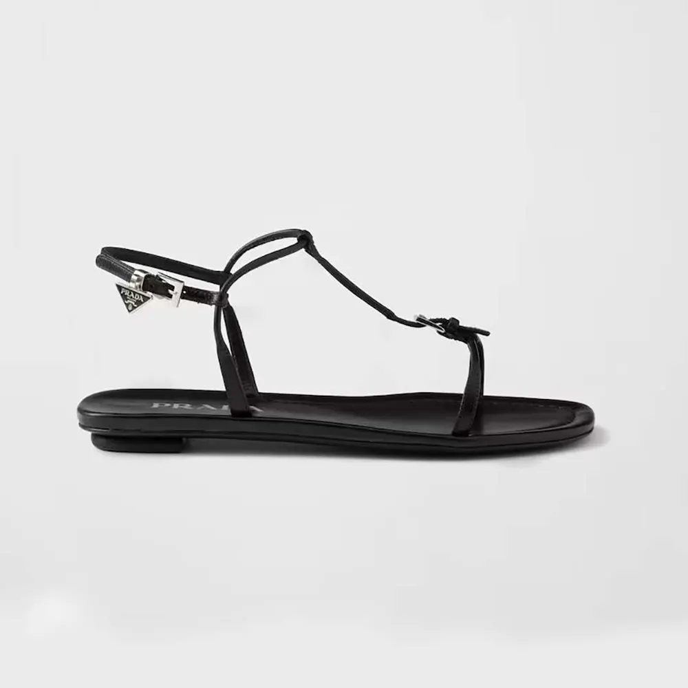 Side profile of Prada Women Flat Leather Sandals-Black showing silhouette