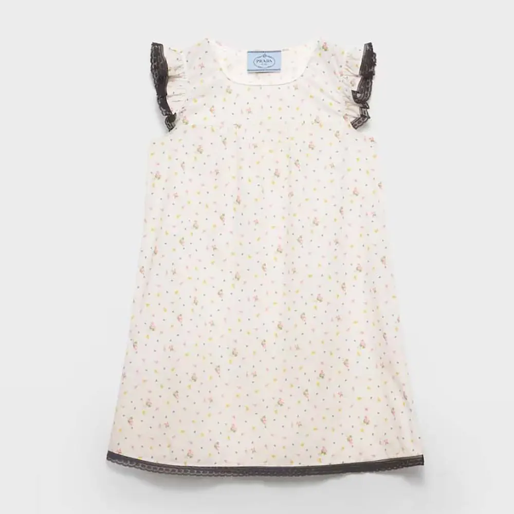 Front view of Prada Women Floral Print Cotton Batiste Mini-dress in white