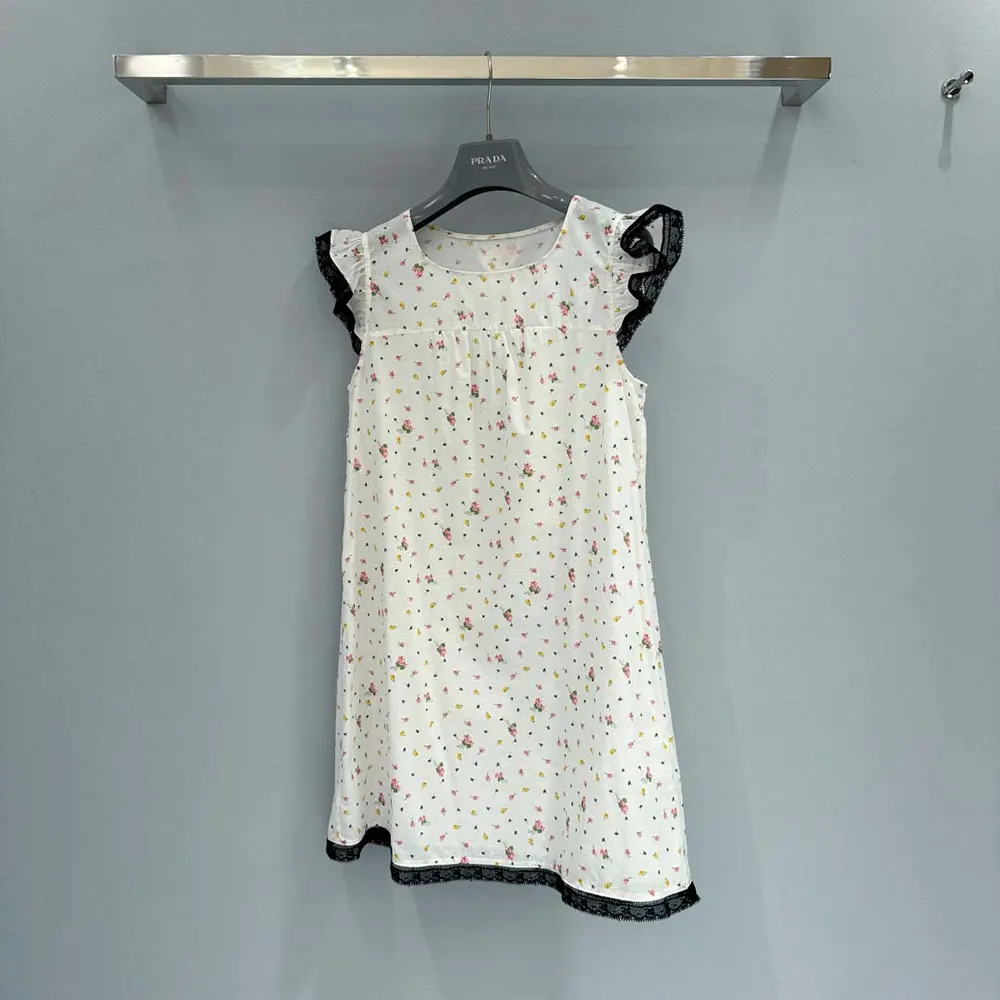 Close-up of floral print and fabric texture on Prada mini-dress
