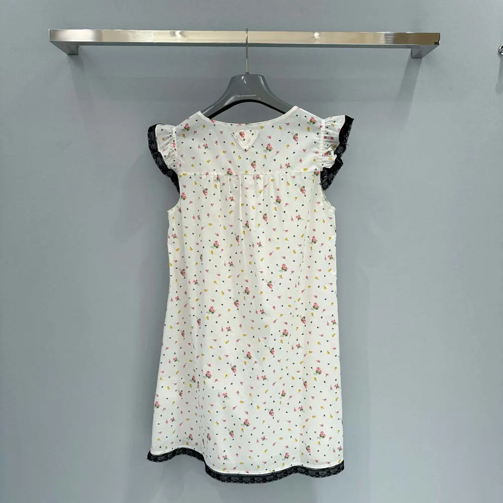Side profile showing silhouette and branded hardware on Prada dress