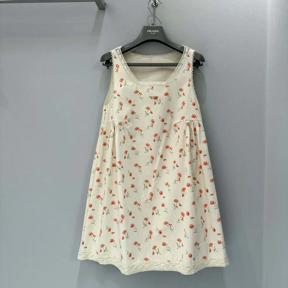Side angle showing silhouette of Prada Women Floral Print Linen Mini-dress