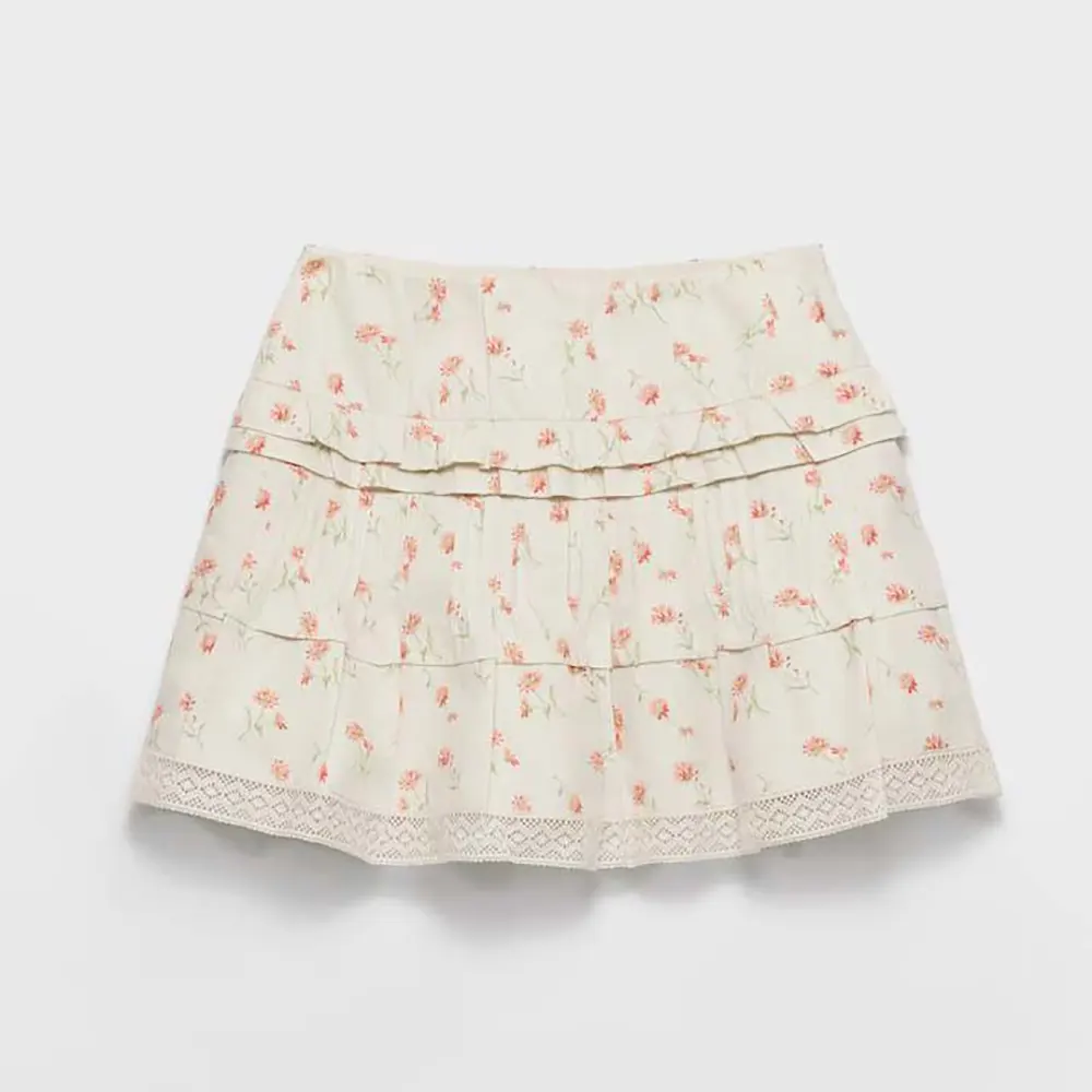 Front view of Prada Women Floral Print Linen Miniskirt in white