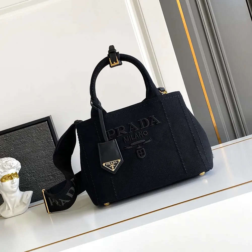 Close-up detail of silver-tone hardware on Prada Women Jardinière handbag
