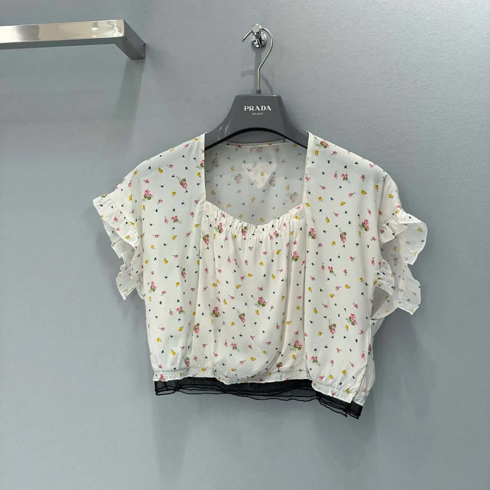 Close-up detail of floral print on Prada Women Short-sleeved Crop Top