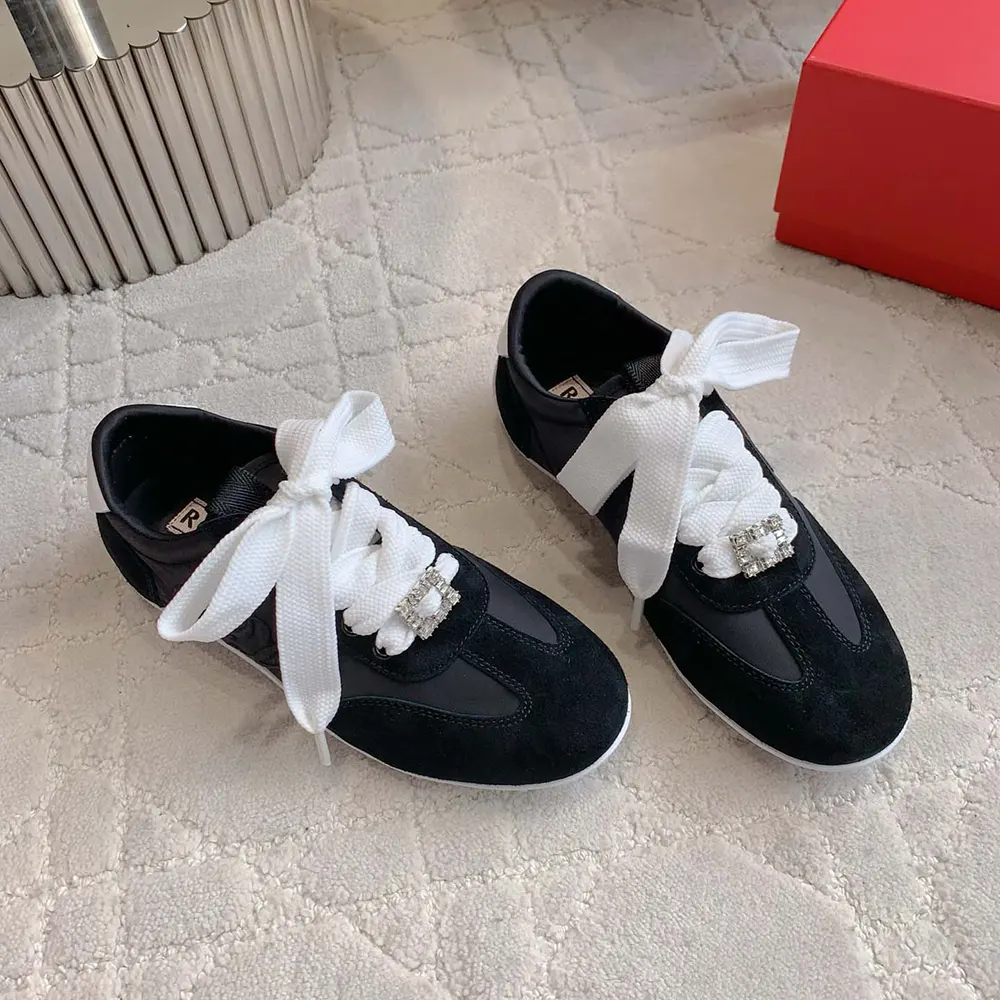 Top view showing black suede texture on Roger Vivier Women Viv Low Sneakers