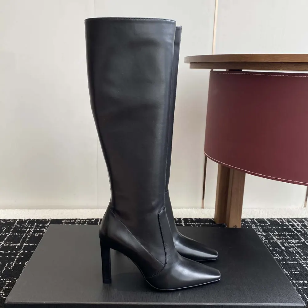 Front angle showing slim high-heel silhouette of Saint Laurent Francoise boots