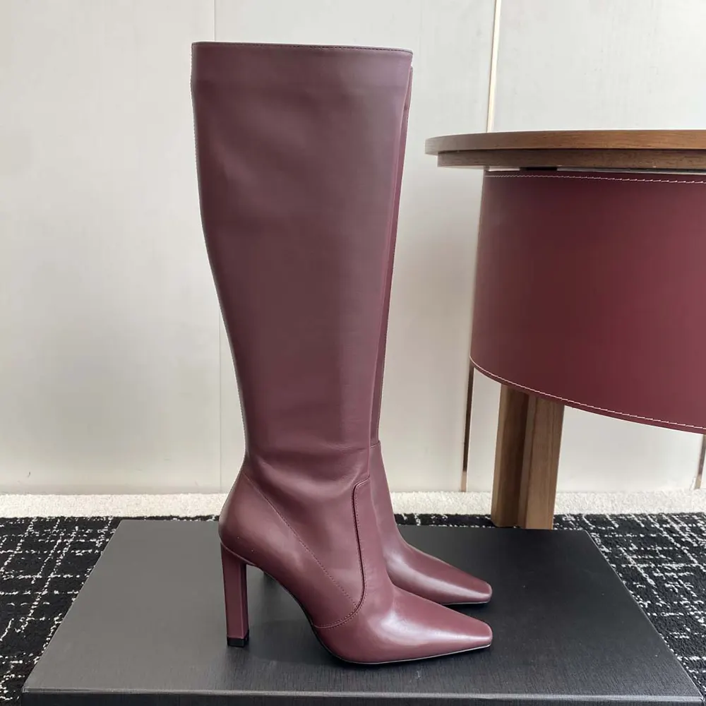 Front angle showing slim high heel of Saint Laurent YSL Francoise Boots