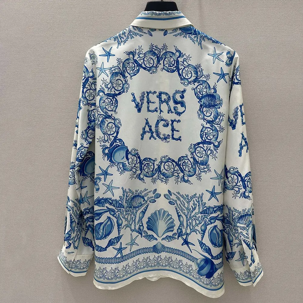 Side angle showing fitted silhouette of Versace underwater crêpe shirt