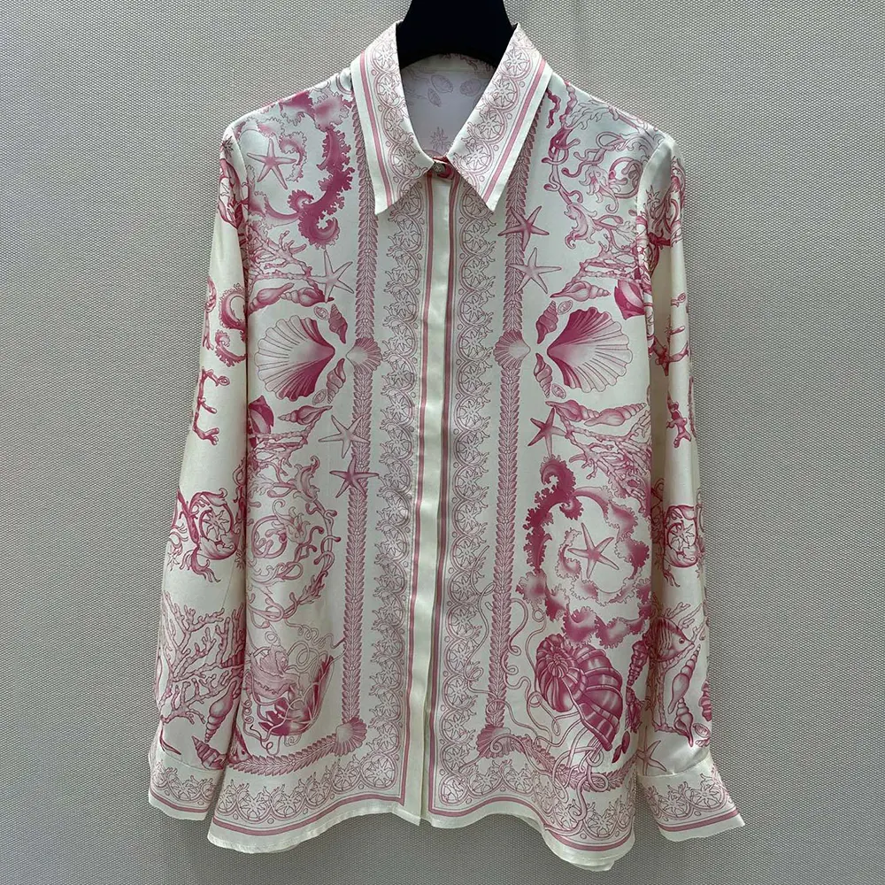 Close-up of gold Medusa buttons on Versace Women Underwater Barocco Fitted Shirt