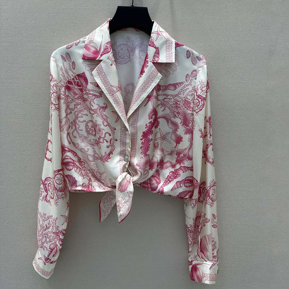 Close-up detail of knotted front on Versace Women Underwater Barocco Knotted Crop Silk Shirt