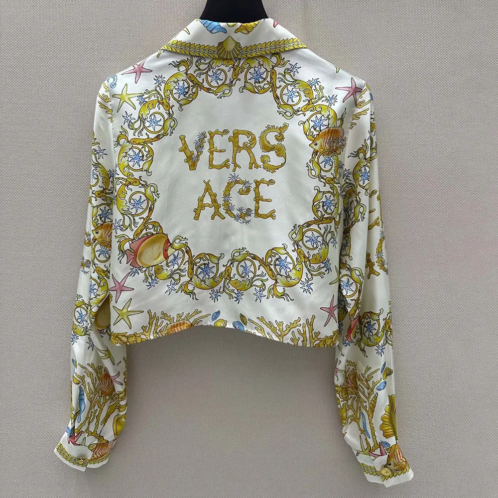 Side angle showcasing cropped fit of Versace Women Underwater Barocco Shirt