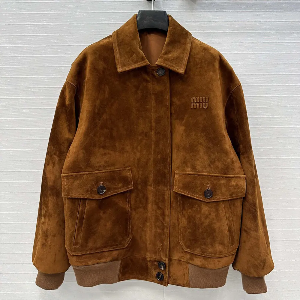 Close-up of Miu Miu Women Suede Blouson Jacket zipper and hardware detail