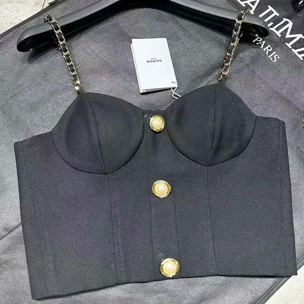 Close-up of chain hardware detail on Balmain Women Top Mit Kettenriemen-Black