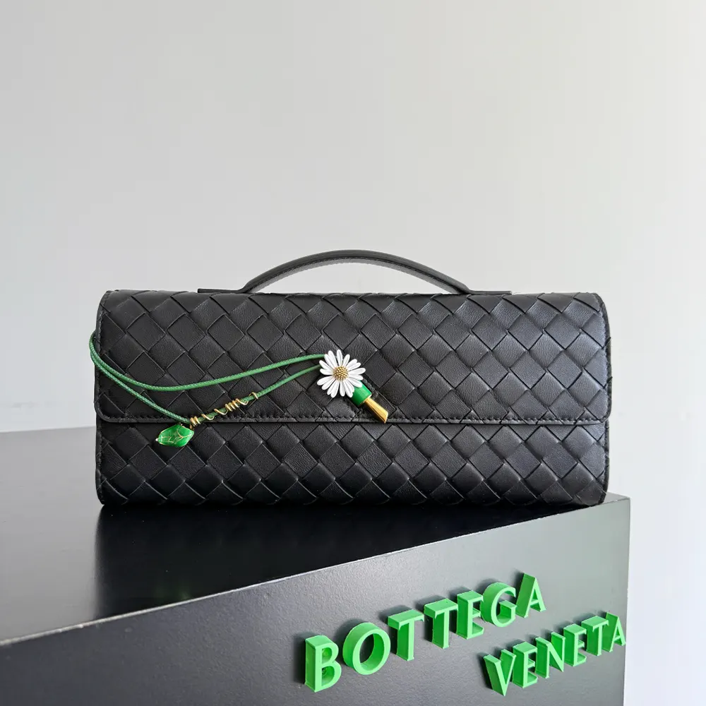 Close-up detail of signature woven texture on Andiamo Clutch