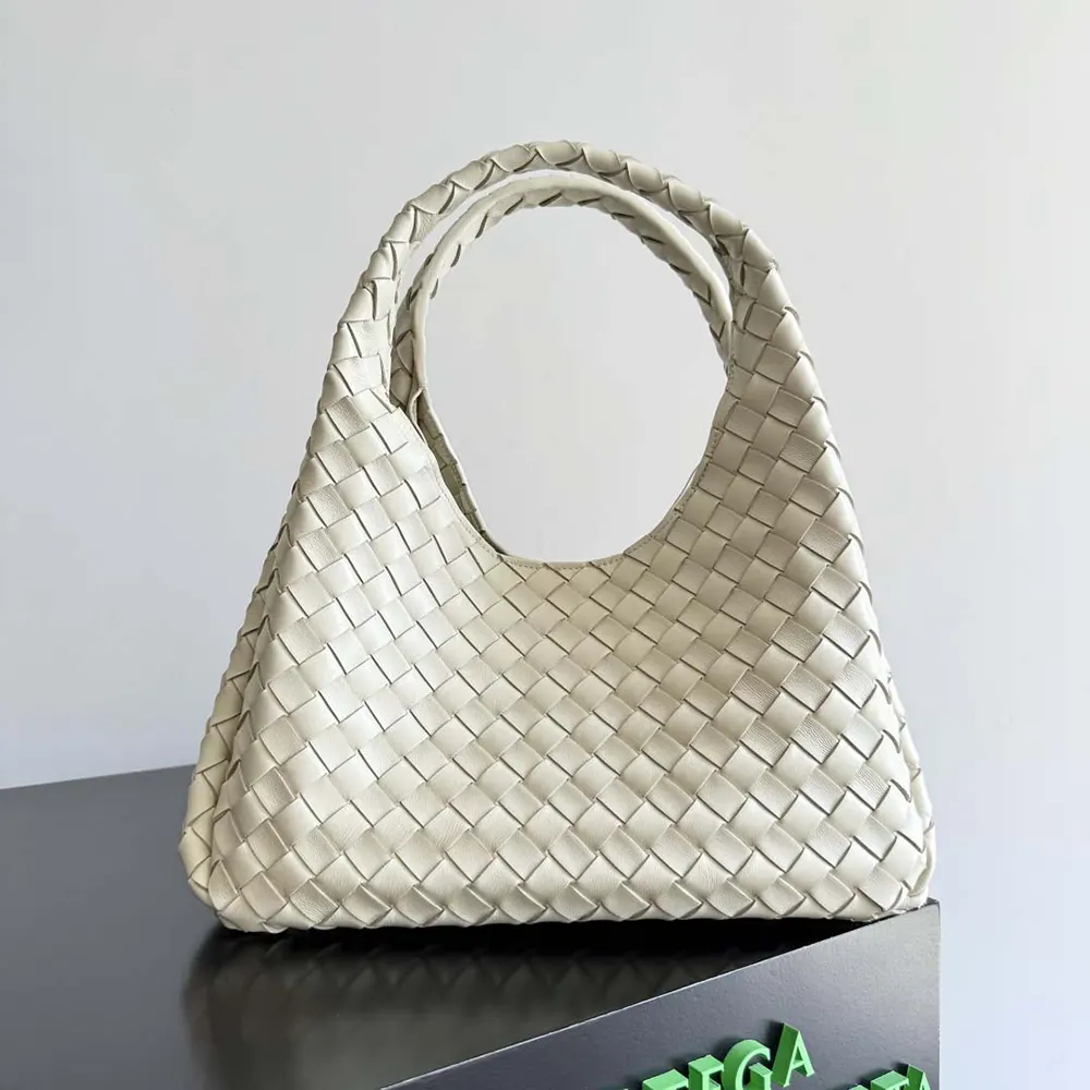 Close-up of intrecciato weave and silver hardware on Campana-White bag