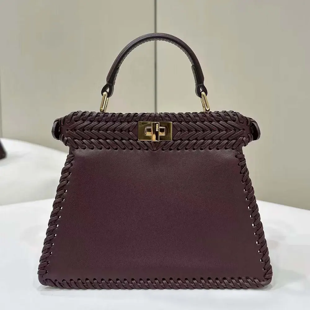 Side angle showing gold hardware and strap of Fendi Peekaboo ISeeU Petite