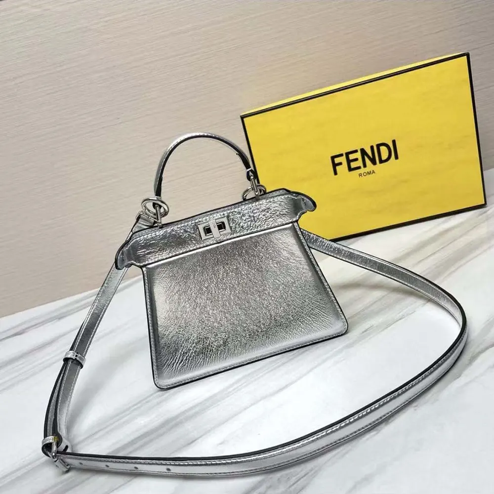 Side angle showing padded nappa leather texture on Fendi Peekaboo ISeeU Petite Mini