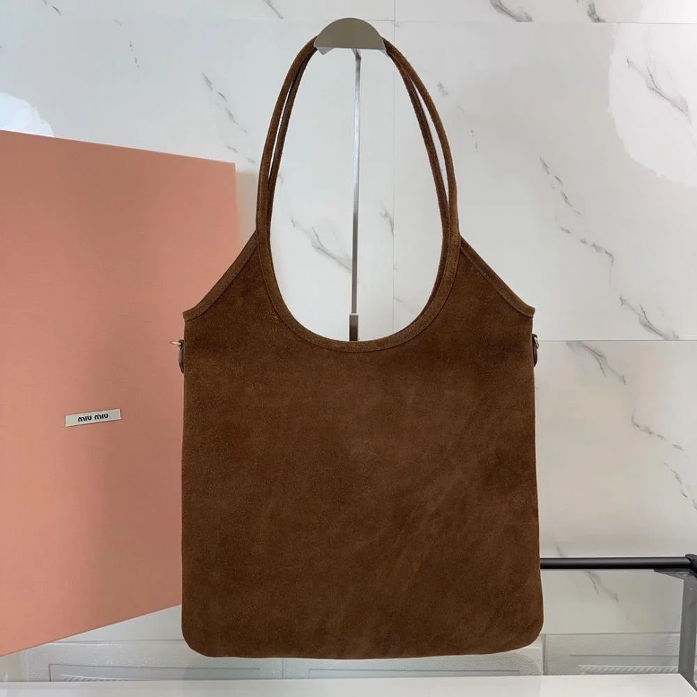 Side angle showing suede texture on Miu Miu Women Ivy Suede Bag-Dark Brown